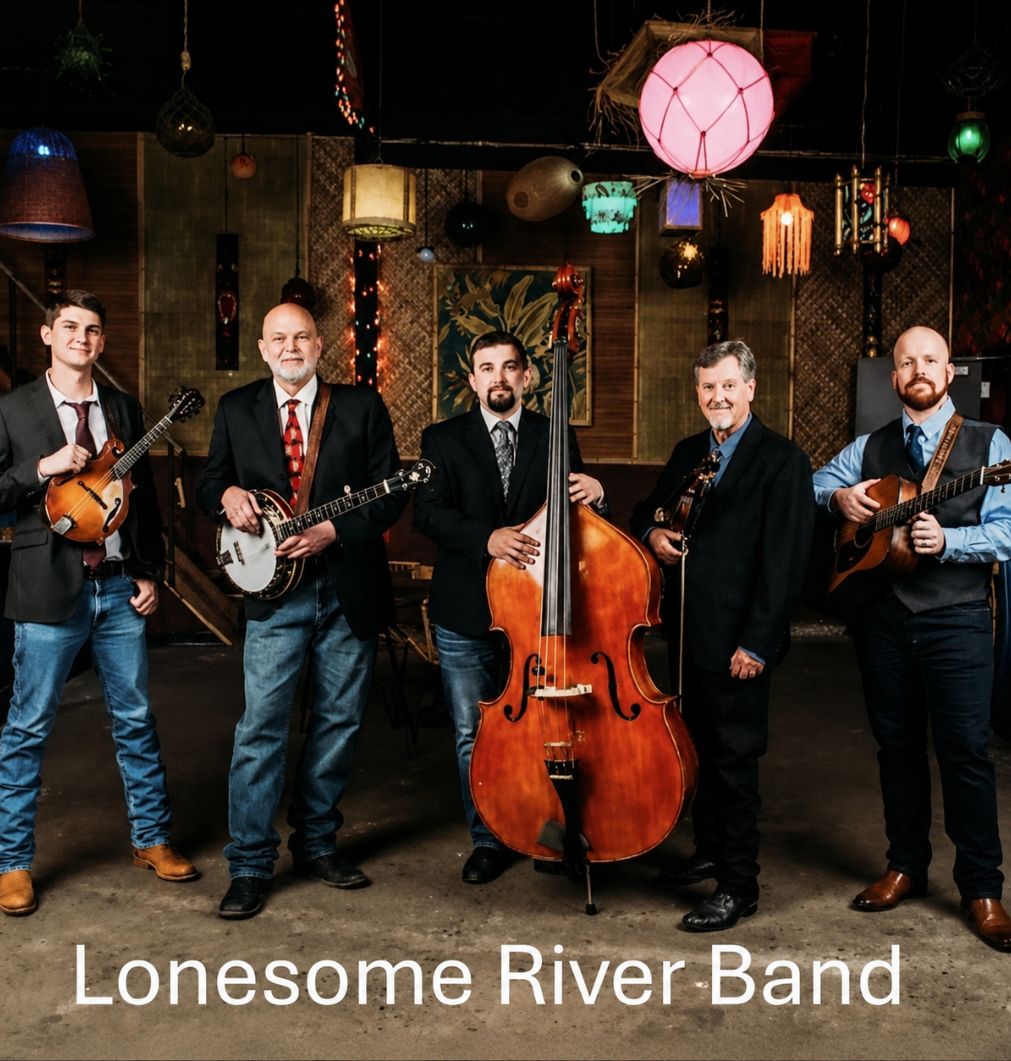 Lonesome River Band posing with instruments